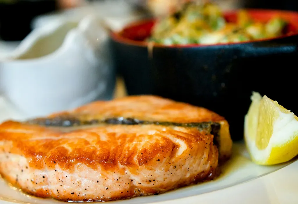 Baked potato filled with salmon and shrimp spread