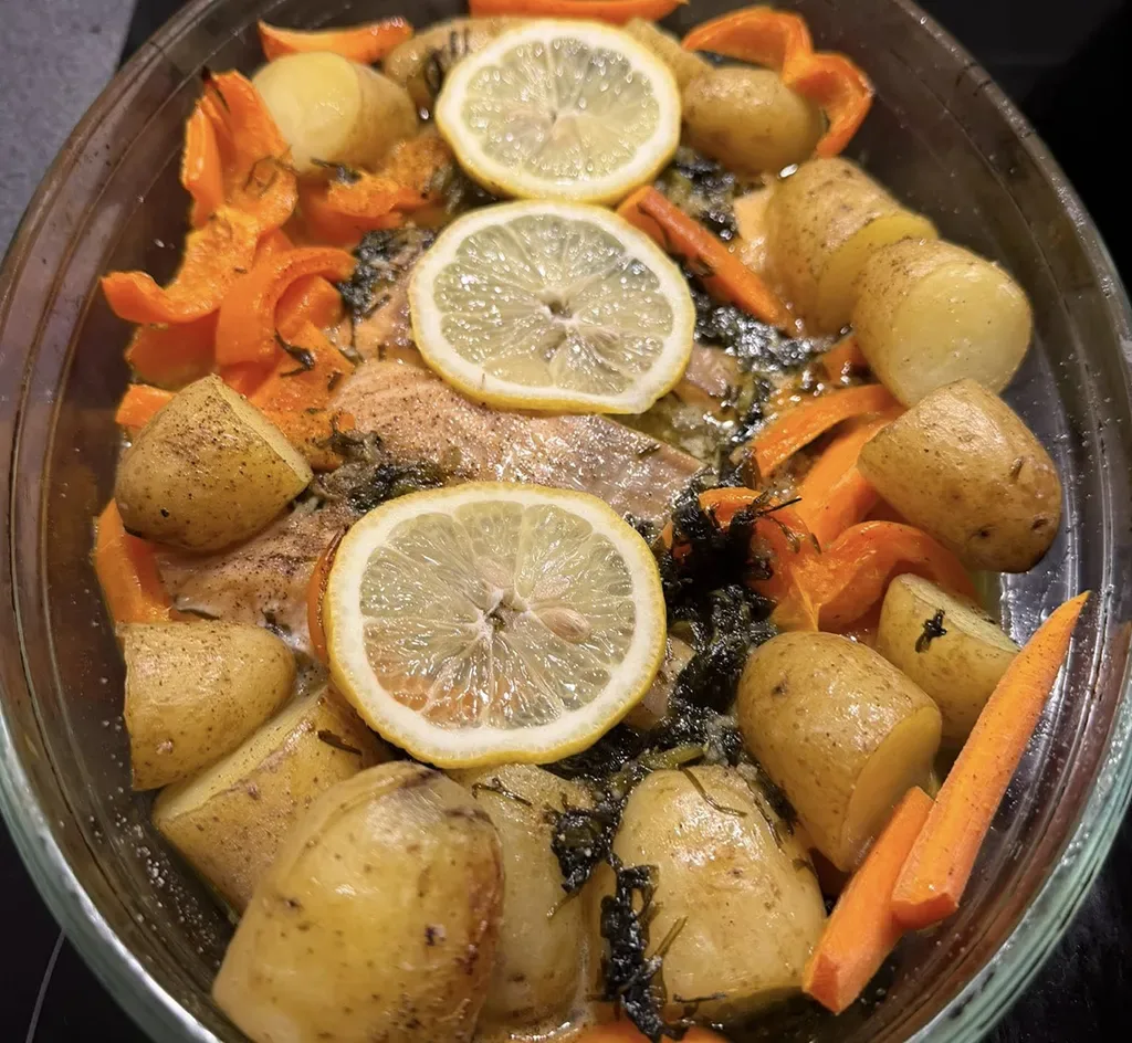 Herb-marinated salmon side with baby potatoes