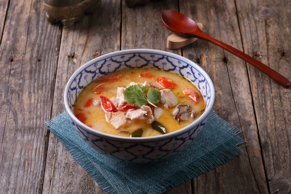 Tom Kha Gai in a blue and white bowl
